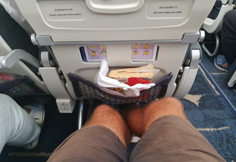 photo of two legs to indicate how much seat space there in on the A350-900