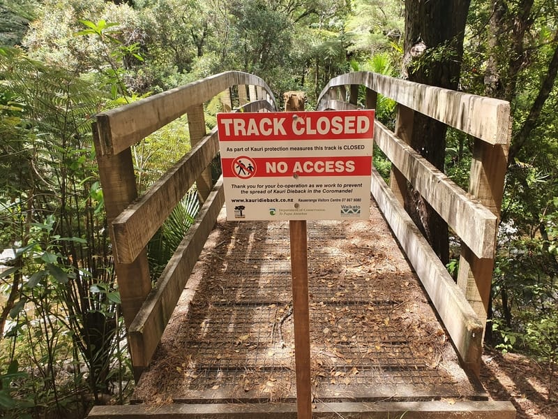 sign saying the track is closed on the bridge