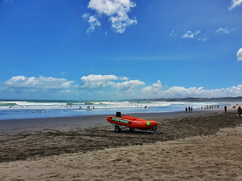 photo of a surf lifesaving boat on a beach