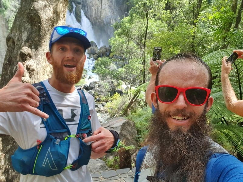 two men at tarawera falls during ultramarathon