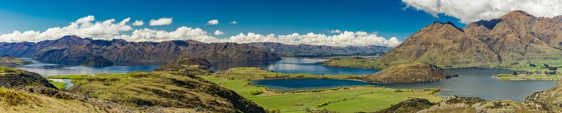 wide angle landscape photo with lakes and hills