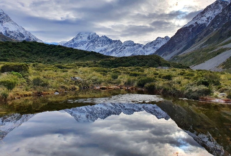 reflections from the tarn on the hooker valley track
