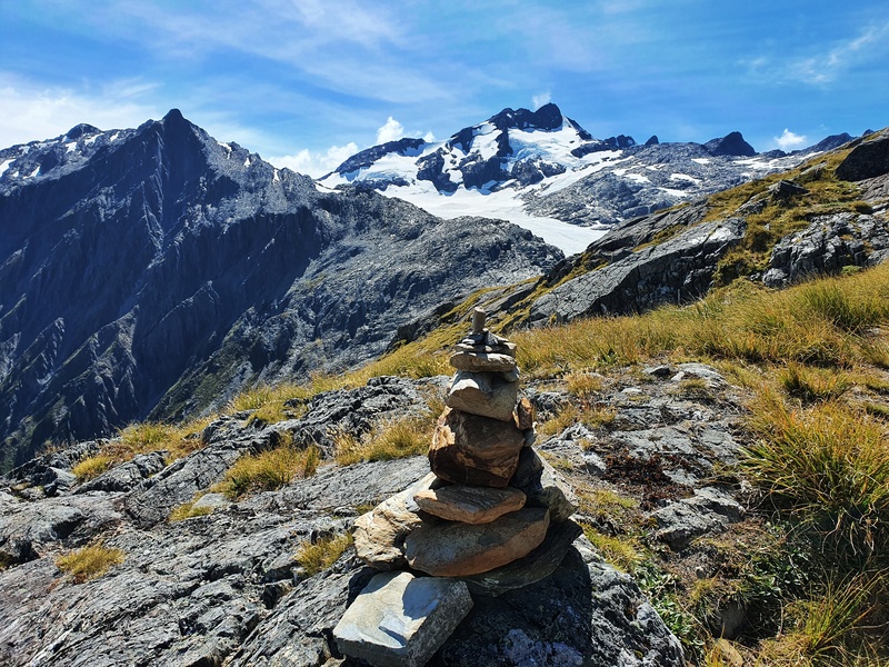cairn with mount brewster in the distance