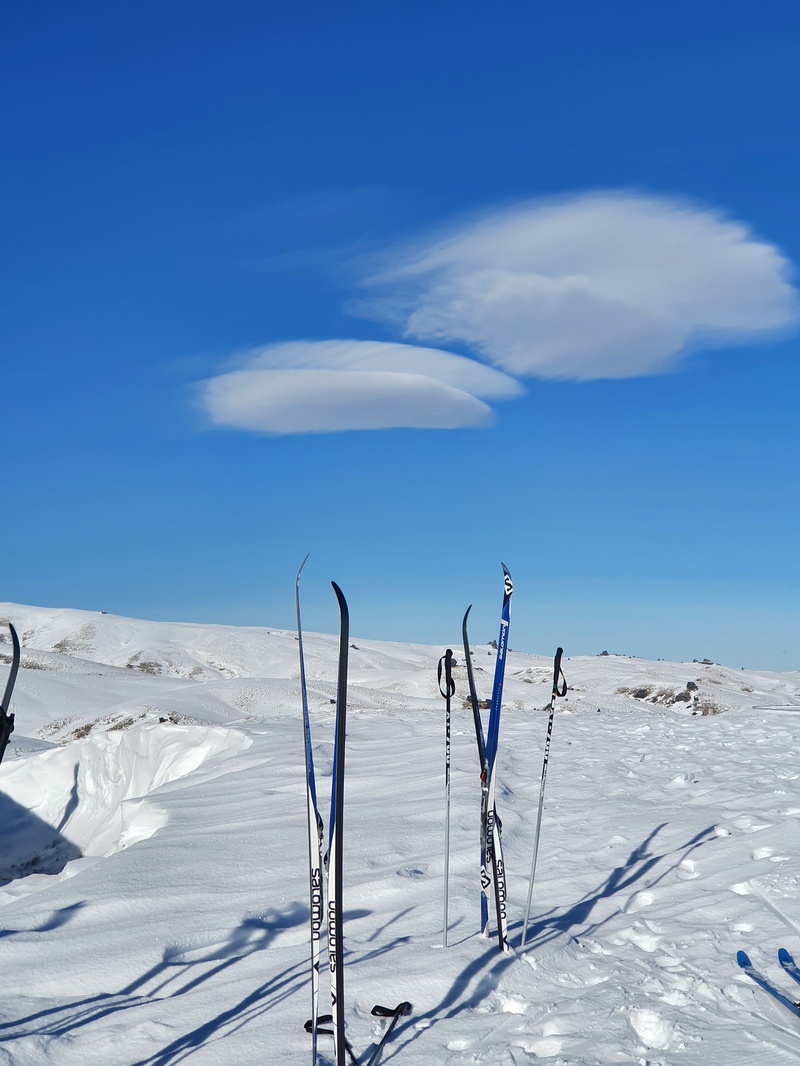 lenticular clouds and skis