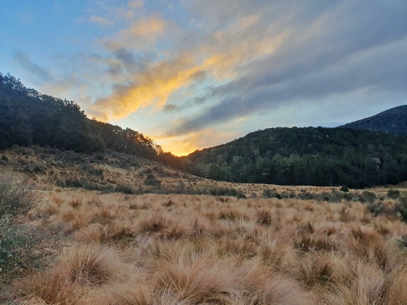 sunset at kiwi burn hut