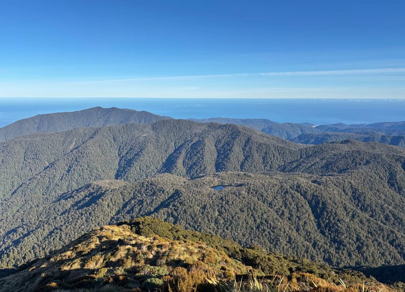 starting down the maori saddle route with lake law in view